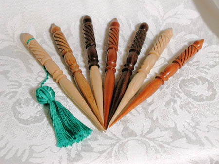 Hand Carved; L-R: Maple, Mulberry, Walnut/Maple, Mahogany, Walnut, Apple, & Cherry; $48.00 each 